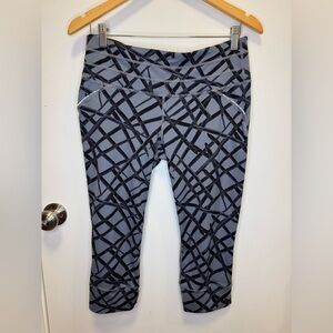 Athleta Women’s Splash Relay Capri leggings Leggings - Black and Flint Gray